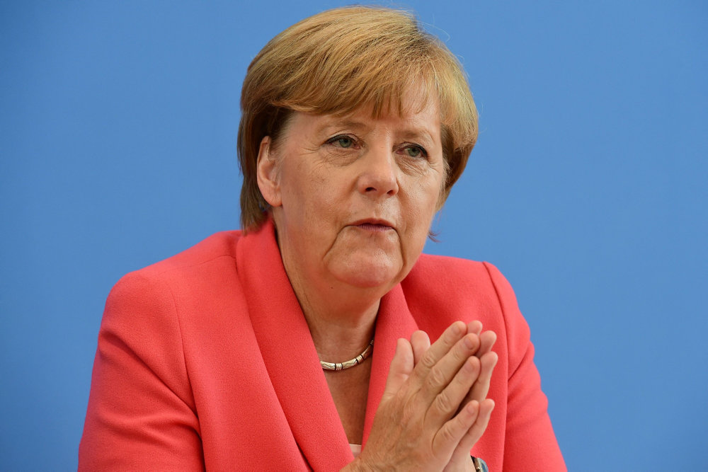 Merkel lod flygtninge strømme ind og står ved det trods AfD-fremgang