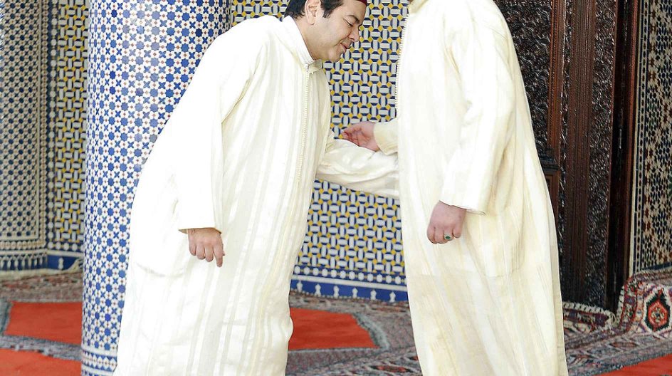 Morocco's King Mohammed VI congratulates his brother Prince Moulay Rachid after Eid-al-Adha prayer at Ahl Fez mosque in Rabat November 17, 2010. Picture taken November 17, 2010. REUTERS/MAP(Morocco News Agency)/Handout (MOROCCO - Tags: POLITICS RELIGION ROYALS) FOR EDITORIAL USE ONLY. NOT FOR SALE FOR MARKETING OR ADVERTISING CAMPAIGNS. THIS IMAGE HAS BEEN SUPPLIED BY A THIRD PARTY. IT IS DISTRIBUTED, EXACTLY AS RECEIVED BY REUTERS, AS A SERVICE TO CLIENTS