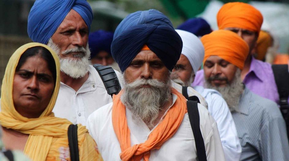 Lahore 2014-06-21 LAHORE, PAKISTAN - JUNE 21 : Indian Sikh pilgrims arrive at Wagah railway station to attend the 175th death anniversary of Maharaja Ranjit Singh in Lahore, Pakistan on June 21, 2014. More than 400 Sikhs arrived in Pakistan on Saturday afternoon to attend a ceremony marking the 175th death anniversary of Maharaja Ranjit Singh who was the founder of the Sikh empire and also known as 'Sher-e-Punjab' or 'Lion of Punjab' . Rana Irfan Ali / Anadolu Agency Photo: Rana Irfan Ali / AA ....