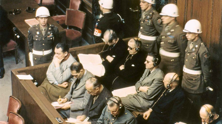 Postwar period: Nuremberg War Crimes Trial at the allied military tribunal (20.11.1945-1.10.1946).-View of the defendants' dock. 1st row, from left: Goering, Hess, Ribbentrop, Keitel; 2nd row, from left: Doenitz, Raeder, von Schirach, Sauckel and Jodl.-Photo, undated.