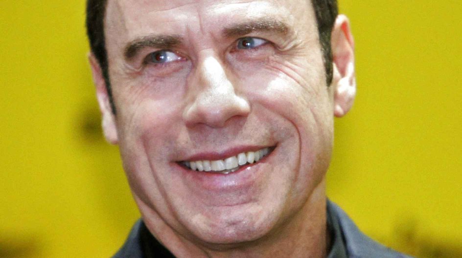 Actor John Travolta smiles before a news conference in Singapore, in this file picture taken July 30, 2012. The departure of U.S. actress Leah Remini from the Church of Scientology this week raised new questions about the relationship top leaders assume with their high-profile Hollywood members and their ability to retain them. Scientology, which was founded in 1954 by science-fiction writer L. Ron Hubbard, has attracted several Hollywood stars including Tom Cruise and John Travolta. To match st....