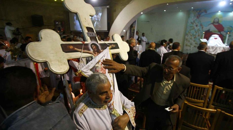 (150411) - - CAIRO, April 11, 2015 () - - Egyptian Coptic Christians attend the Orthodox Easter mass at the St. Samaan Church in Cairo, Egypt, on April 11, 2015. (/Ahmed Gomaa)