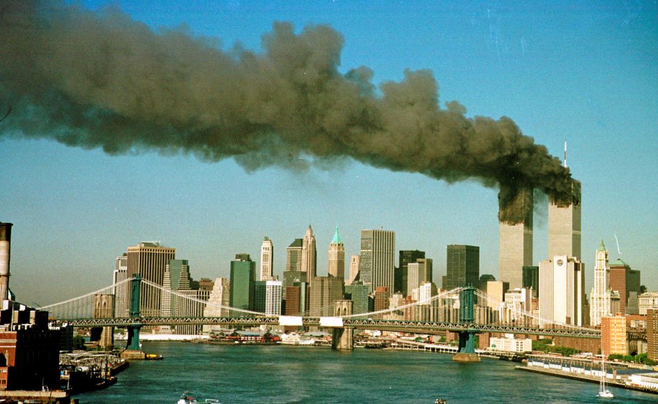 Smoke is seen at the towers of the World Trade Center shortly after being struck by a hijacked commercial aircraft, in New York, U.S., September 11, 2001. REUTERS/Brad Rickerby